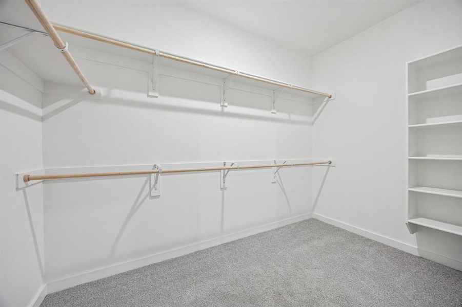 Primary Closet in the Oak II home plan by Trophy Signature Homes – REPRESENTATIVE PHOTO