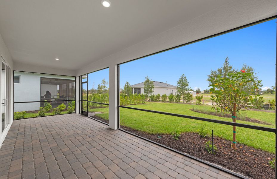 Exterior details and patio area of a home in Del Webb Oak Creek, North Fort Myers (Image 3).