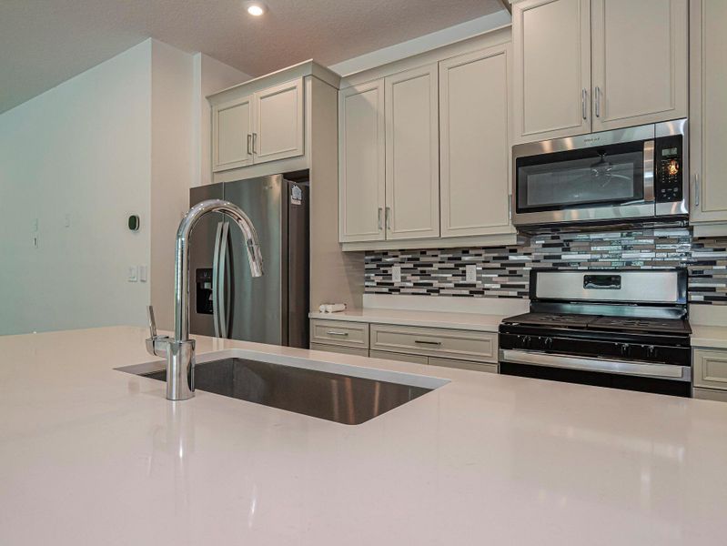 Furnished interior view inside a new home in , Port St. Lucie (Image 8).
