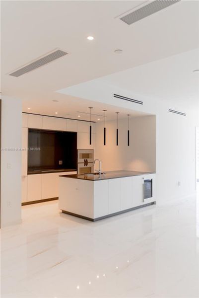 Furnished interior view inside a new home in Aston Martin Residences, Miami (Image 3).