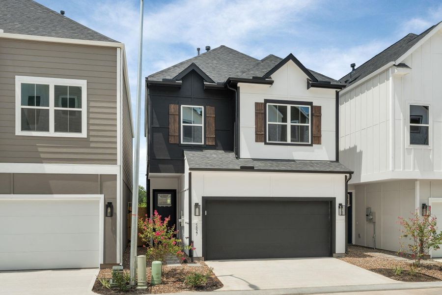 Front exterior of a new home in , Houston, TX, highlighting curb appeal (Image 26).