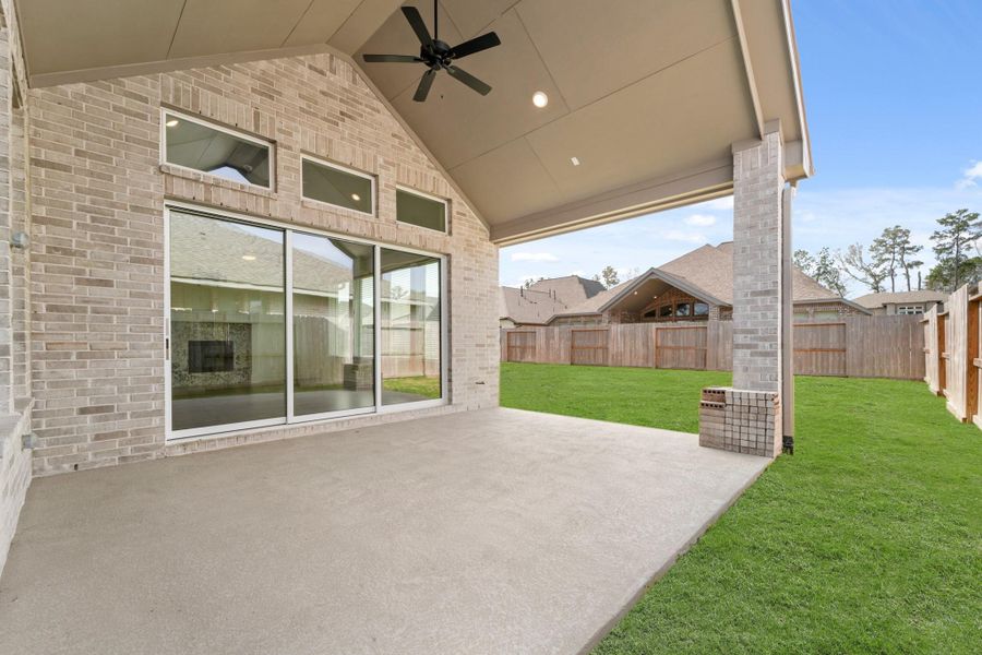 Exterior details and patio area of a home in The Highlands - 65', Porter (Image 25).