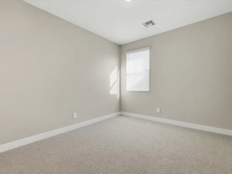 Spacious, unfurnished interior of a new home in Entrada Signature Series, Tolleson (Image 14).