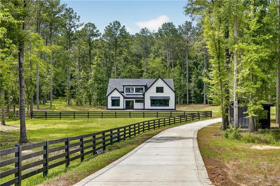 Front exterior of a new home in , Buckhead, GA, highlighting curb appeal (Image 2). Front exterior of a new home in , Buckhead, GA, highlighting curb appeal (Image 2).