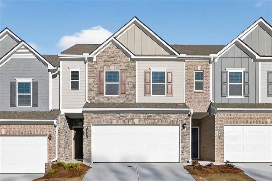 Front exterior of a new home in Franklin Manor, Lawrenceville, GA, highlighting curb appeal (Image 1). Front exterior of a new home in Franklin Manor, Lawrenceville, GA, highlighting curb appeal (Image 1).