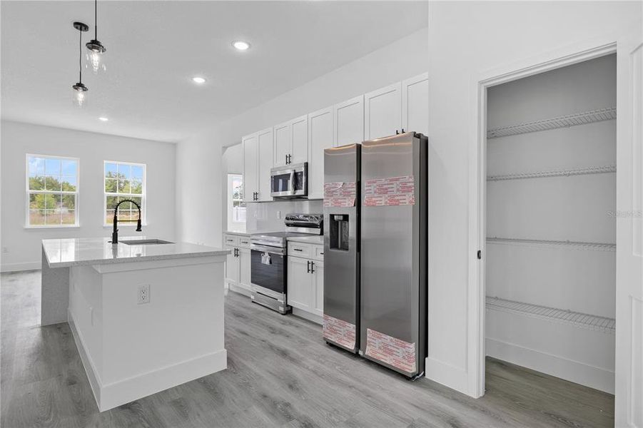 Furnished interior view inside a new home in , Ocala (Image 8).