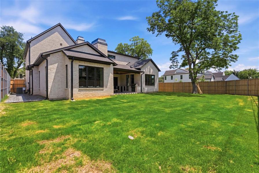 Spacious backyard with mature trees, lush lawn, and covered patio - ample room for a pool Spacious backyard with mature trees, lush lawn, and covered patio - ample room for a pool