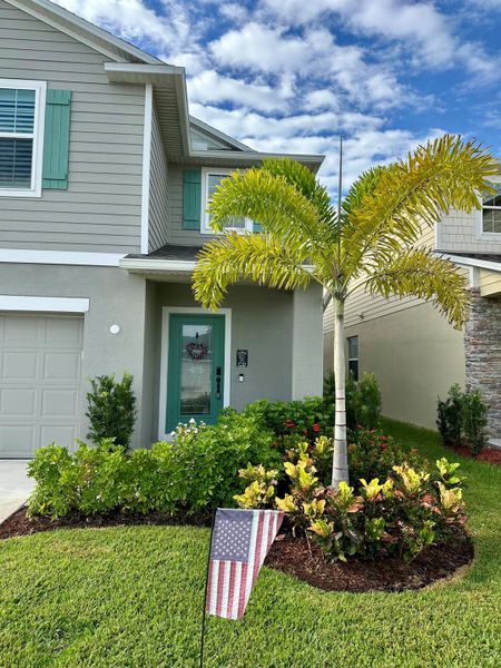 Front exterior of a new home in , Port St. Lucie, FL, highlighting curb appeal (Image 34).