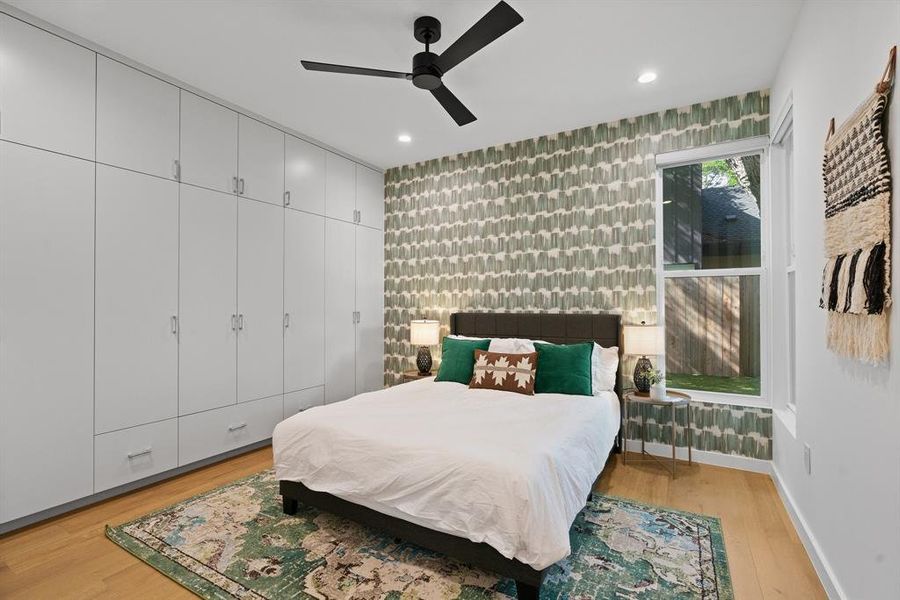 This first floor guest bedroom has more storage than most closets.