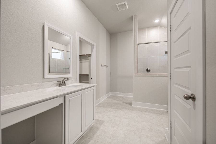 Representative furnished interior of a home built from the Morgan by Chesmar Homes in Stillwater Ranch, San Antonio (Image 7).