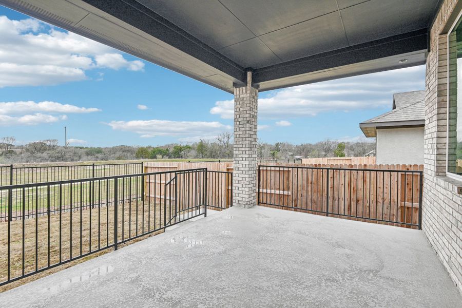 Exterior details and patio area of a home in Village at Three Oaks, Seguin (Image 27). Exterior details and patio area of a home in Village at Three Oaks, Seguin (Image 27).