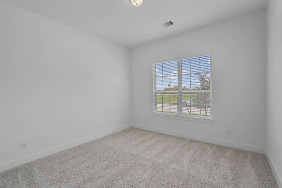 Representative unfurnished interior of a home built from the Mickelson by Chesmar Homes in Riceland Alley Loads, Mont Belvieu (Image 85).