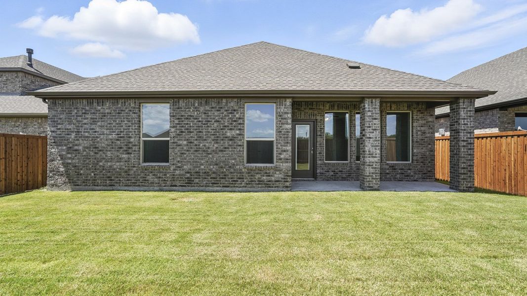 Representative exterior photo of a completed home built from the Vail by D.R. Horton in Madera, Royse City, TX (Image 27). Representative exterior photo of a completed home built from the Vail by D.R. Horton in Madera, Royse City, TX (Image 27).