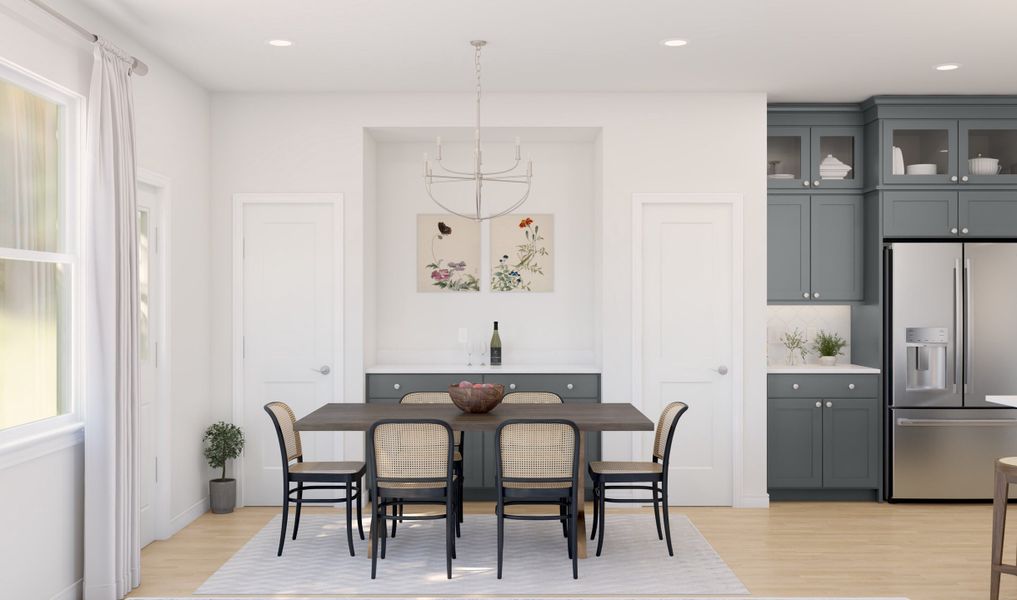 Dining area with chandelier adjacent to kitchen