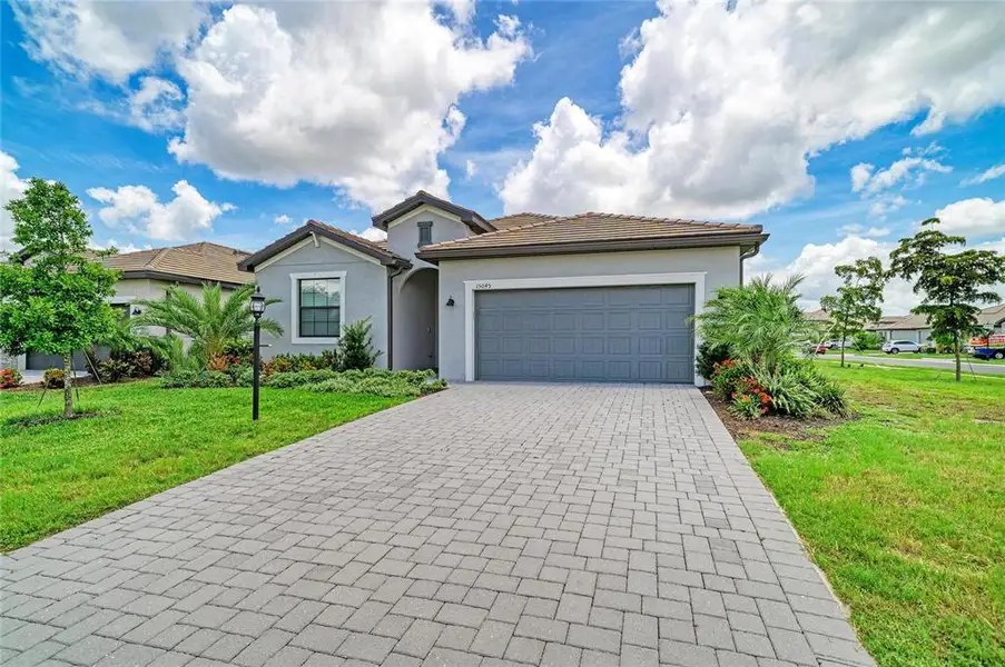 Front exterior of a new home in , Bradenton, FL, highlighting curb appeal (Image 29). Front exterior of a new home in , Bradenton, FL, highlighting curb appeal (Image 29).