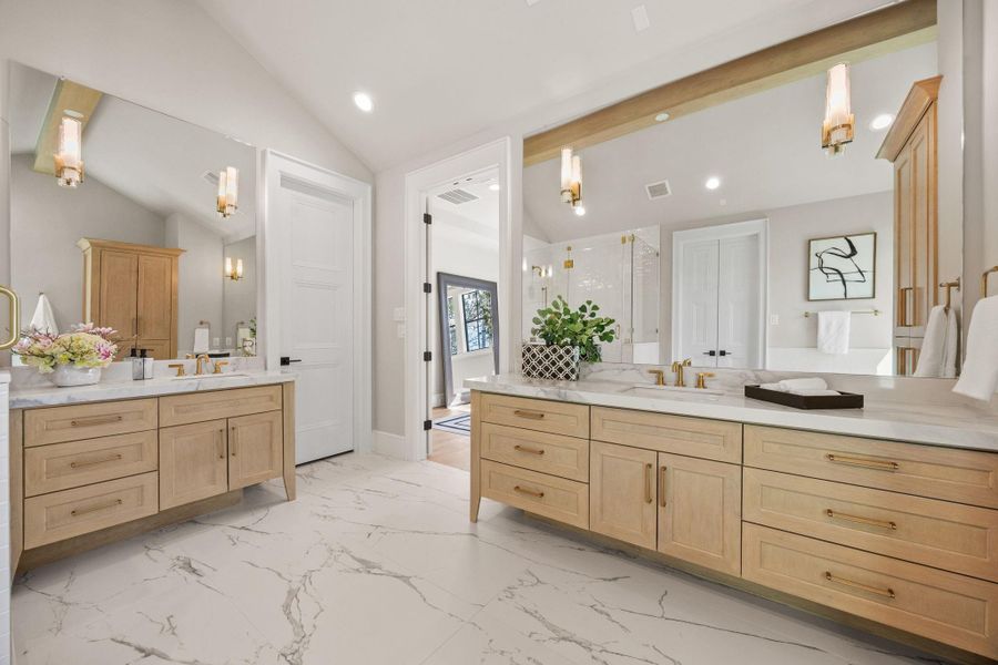 Full Vanity view from the soak tub. Custom site-built vanities w/ Designer selected fixtures.