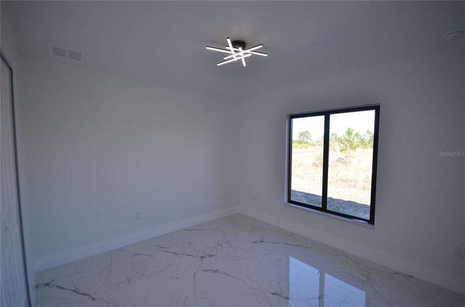 Spacious, unfurnished interior of a new home in , Lehigh Acres (Image 17).