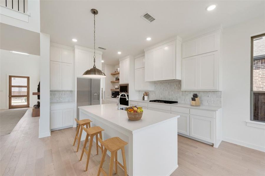 Furnished interior view inside a new home in Inspiration - Paradise Village, Wylie (Image 13). Furnished interior view inside a new home in Inspiration - Paradise Village, Wylie (Image 13).