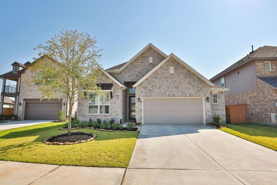 Front exterior of a new home in , Katy, TX, highlighting curb appeal (Image 2). Front exterior of a new home in , Katy, TX, highlighting curb appeal (Image 2).