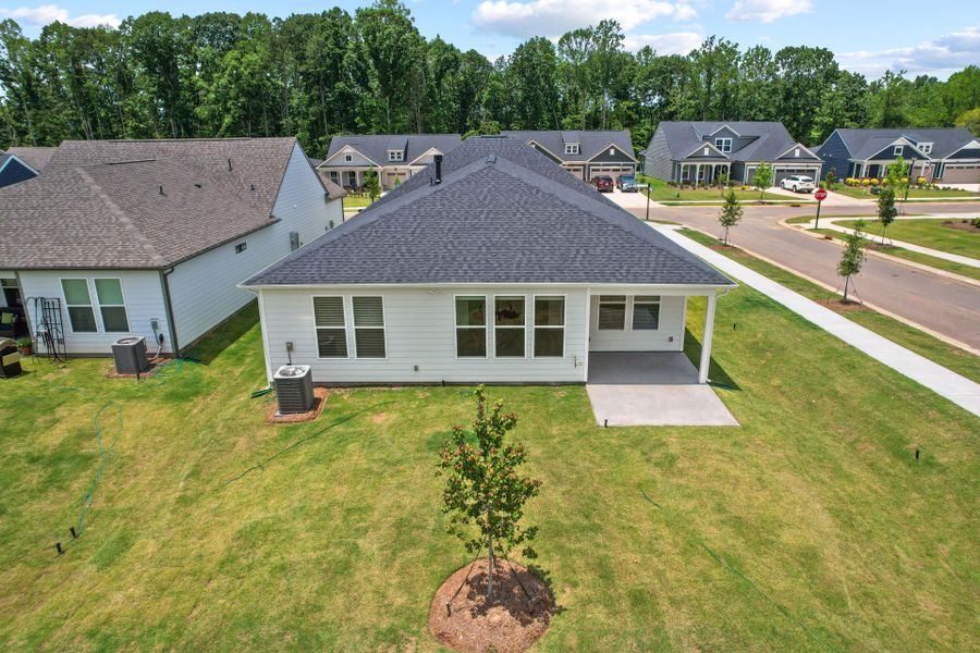 Exterior details and patio area of a home in Carolina Riverside, Belmont (Image 41).
