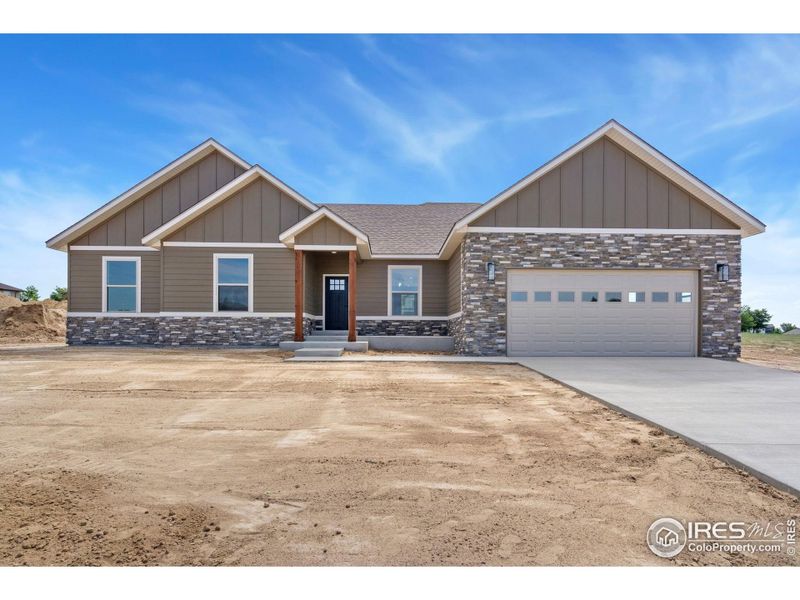 Front exterior of a new home in , Fort Morgan, CO, highlighting curb appeal (Image 16).