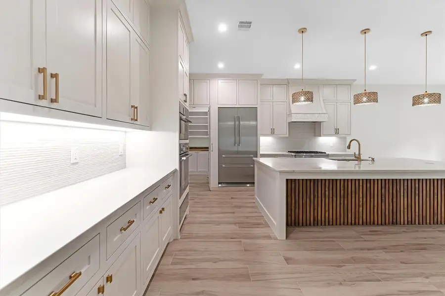 Furnished interior view inside a new home in , Conroe (Image 6).