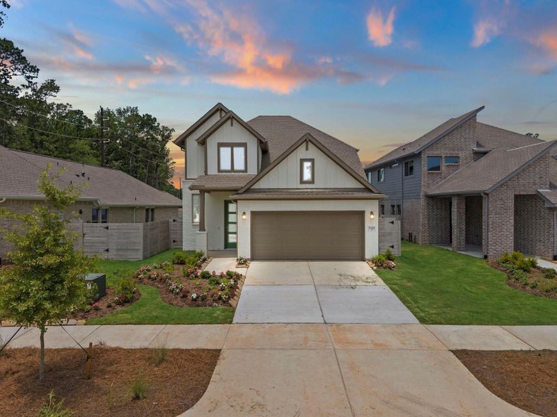 Front exterior of a new home in Two Step Farm, Montgomery, TX, highlighting curb appeal (Image 2). Front exterior of a new home in Two Step Farm, Montgomery, TX, highlighting curb appeal (Image 2).