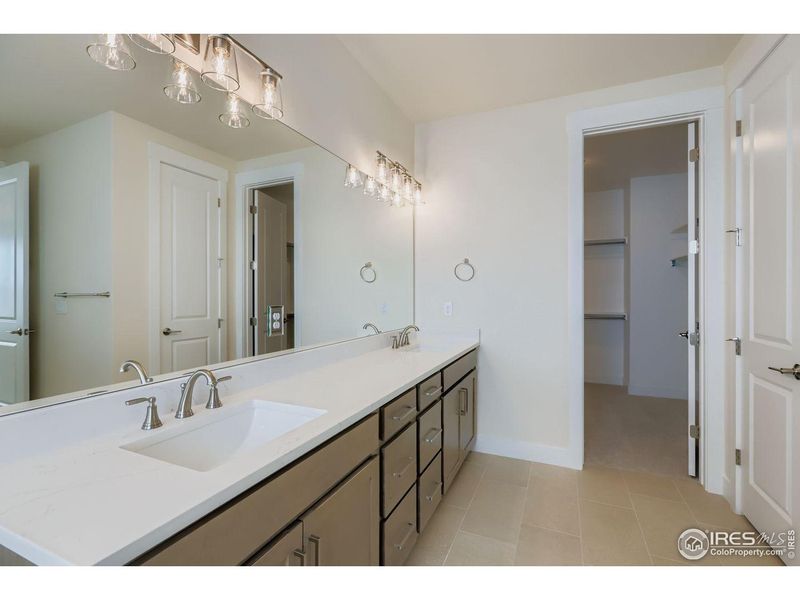 Furnished interior view inside a new home in RainDance, Windsor (Image 13).