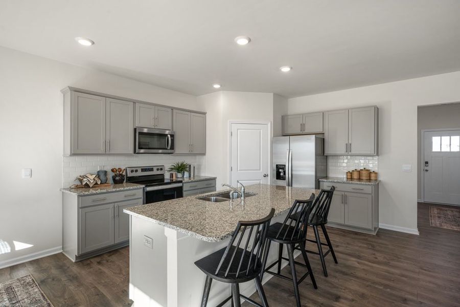 Representative furnished interior of a home built from the HAYDEN by D.R. Horton in Gretchen Pines, West End (Image 10).