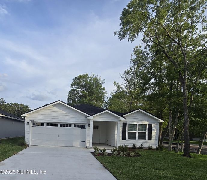 Front exterior of a new home in , Jacksonville, FL, highlighting curb appeal (Image 2). Front exterior of a new home in , Jacksonville, FL, highlighting curb appeal (Image 2).