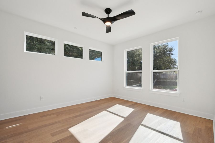 Spacious, unfurnished interior of a new home in Koenig Townhomes, Austin (Image 24).