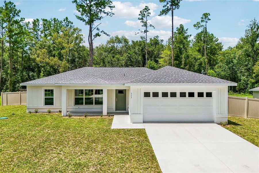Front exterior of a new home in , Citrus Springs, FL, highlighting curb appeal (Image 24). Front exterior of a new home in , Citrus Springs, FL, highlighting curb appeal (Image 24).