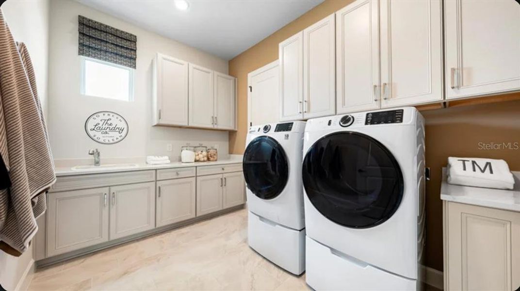Furnished interior view inside a new home in Esplanade at Wellen Park, Englewood (Image 10).