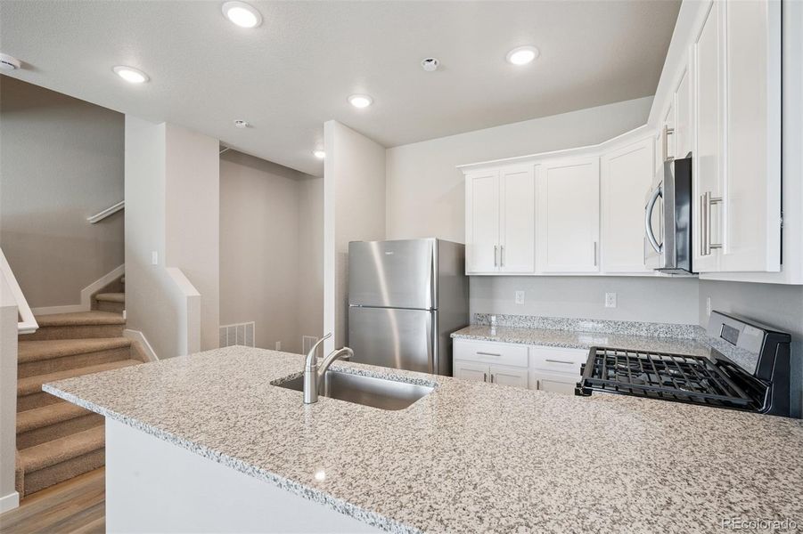 Furnished interior view inside a new home in Cottonwood Greens, Fort Lupton (Image 6).