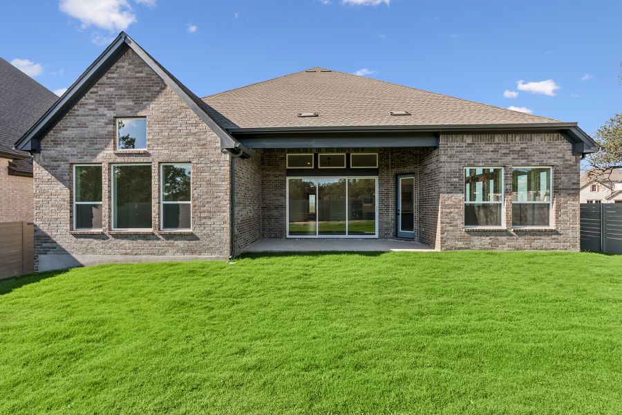 Exterior details and patio area of a home in Wolf Ranch – West Bend, Georgetown (Image 3).