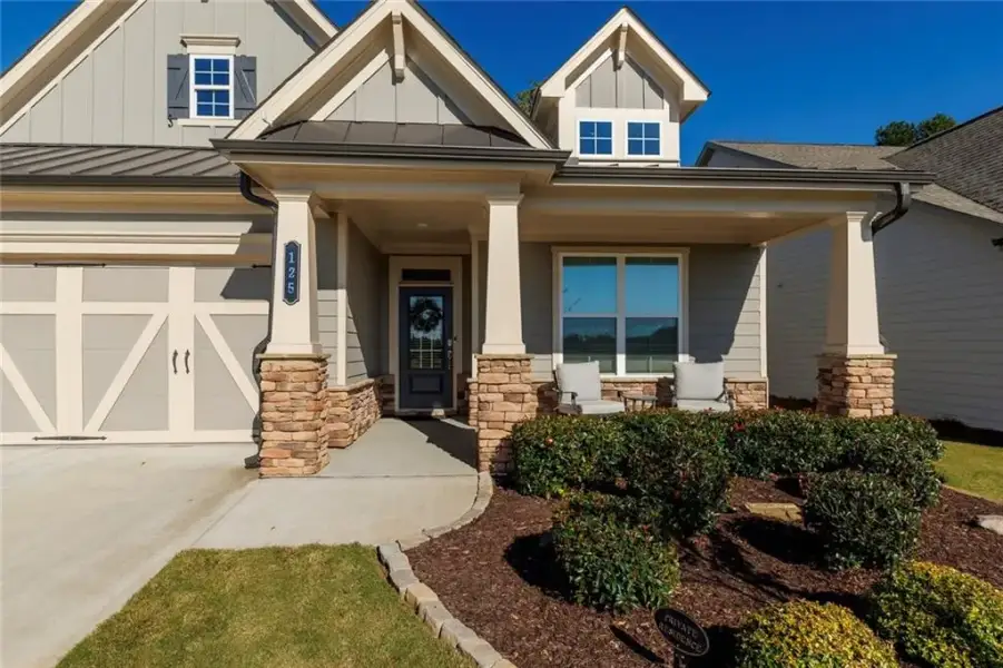 Front exterior of a new home in , Canton, GA, highlighting curb appeal (Image 25). Front exterior of a new home in , Canton, GA, highlighting curb appeal (Image 25).