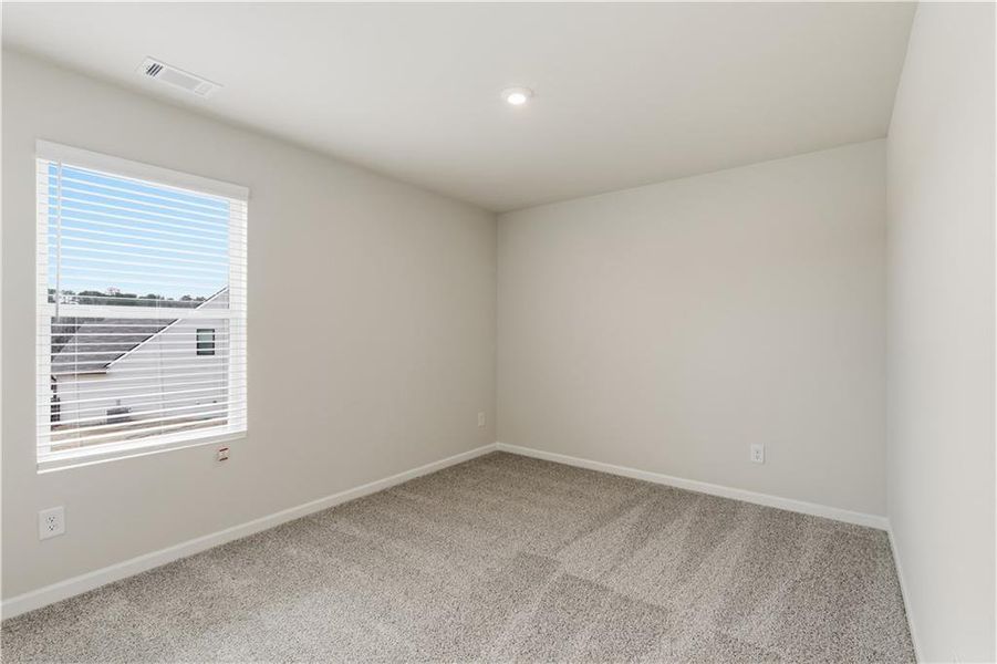Spacious, unfurnished interior of a new home in The Reserve at Chapel Hill Phase II, Douglasville (Image 25).