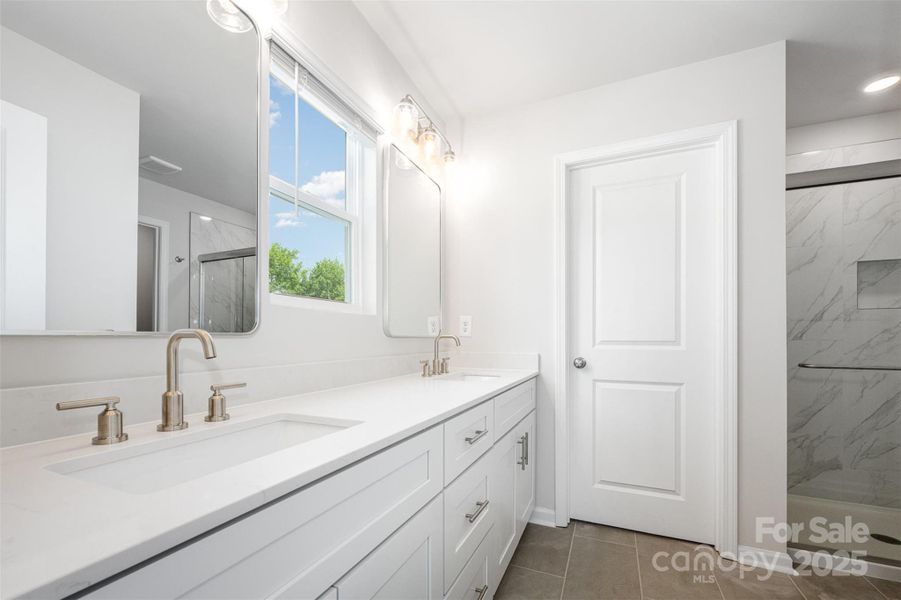 Primary bathroom with double vanity. Representational Photo Primary bathroom with double vanity. Representational Photo