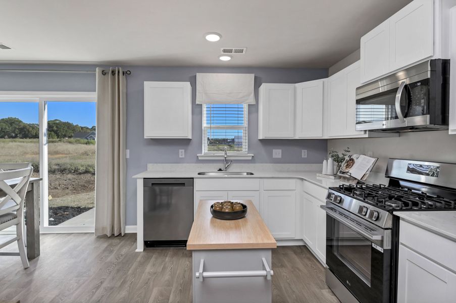 Representative furnished interior of a home built from the Jarrod by Veranda Homes in Trenton Place, Roebuck (Image 12).