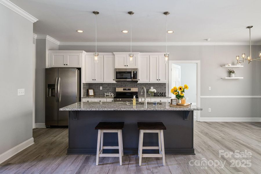 Furnished interior view inside a new home in , Mocksville (Image 9).