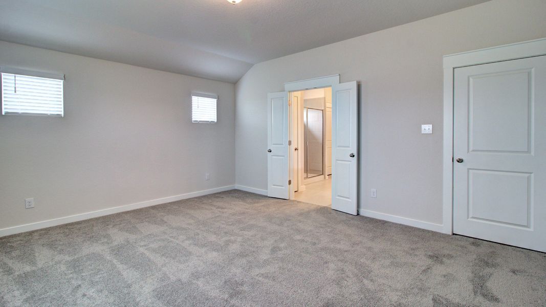 Representative furnished interior of a home built from the Majestic by Brightland Homes in Sunterra, Katy (Image 16).