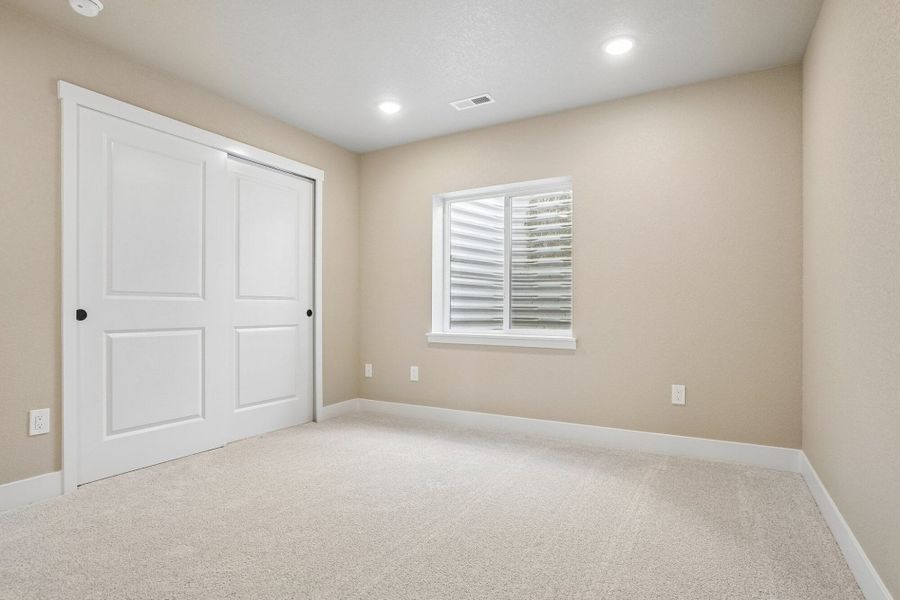 Spacious, unfurnished interior of a new home in Jackson Creek North, Monument (Image 52).