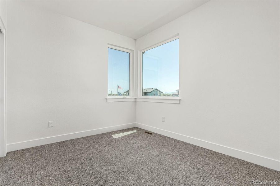Spacious, unfurnished interior of a new home in West Grange, Longmont (Image 21).