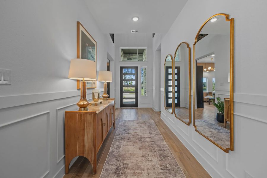 Representative furnished interior of a home built from the Rivercrest by Chesmar Homes in Brookewater 60's, Rosenberg (Image 6).