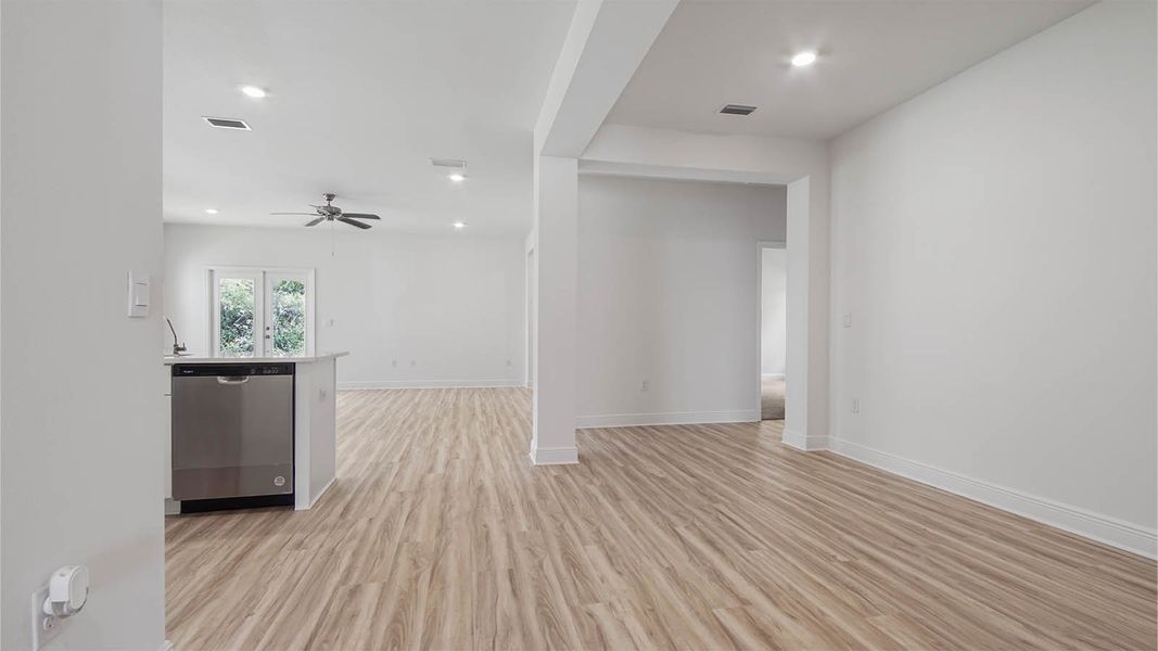 Representative furnished interior of a home built from the Kennedy by D.R. Horton in Bayside at Ward Creek, Panama City Beach (Image 4).