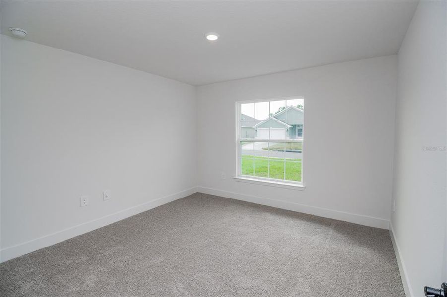 Spacious, unfurnished interior of a new home in Hickory Ridge Estates, Lake Wales (Image 19).