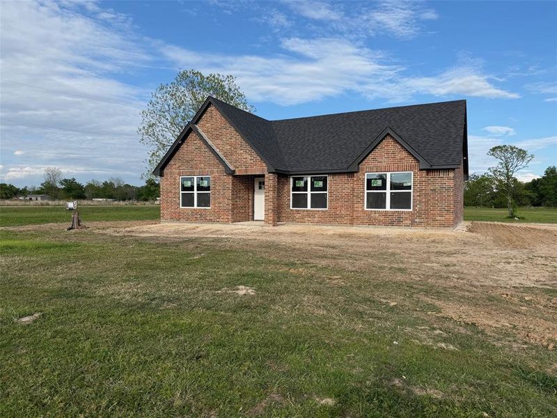 Exterior details and patio area of a home in , Powderly (Image 4).