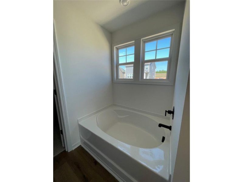 Relax and unwind in this inviting tub, perfect for
