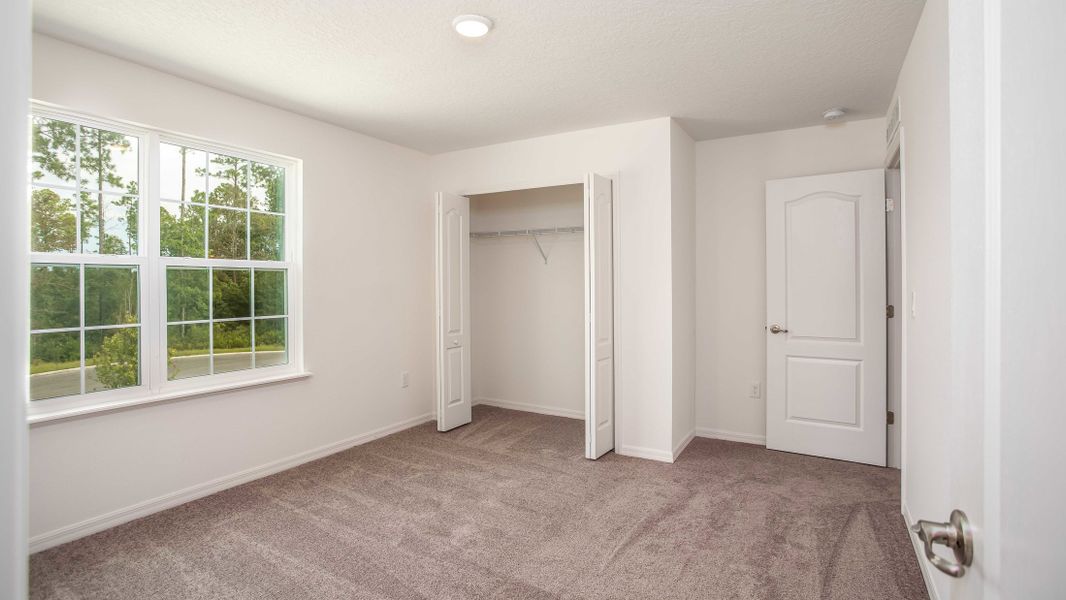 Representative unfurnished interior of a home built from the Carlisle by Maronda Homes in Crosswinds, Haines City (Image 40).