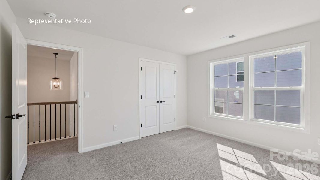 Spacious, unfurnished interior of a new home in Sanctuary at Southgate, Indian Trail (Image 13).